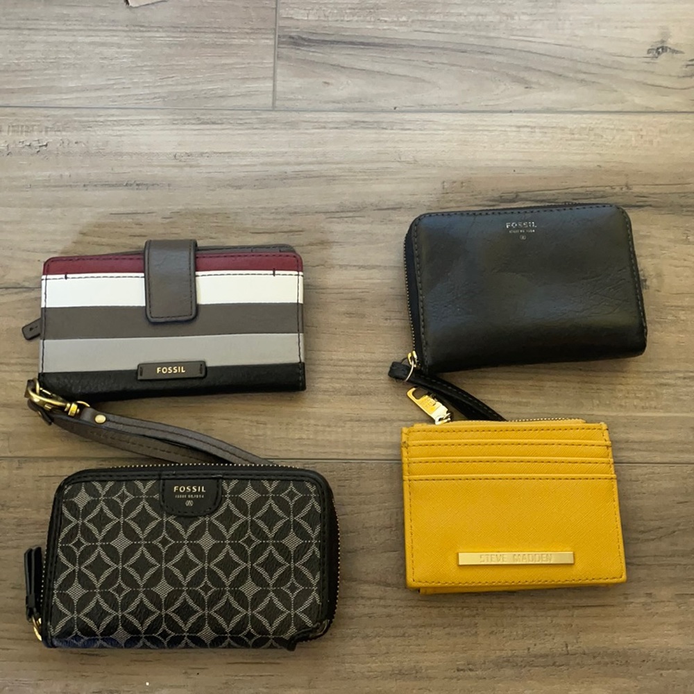 Bundle of fossil and Steve Madden wallets